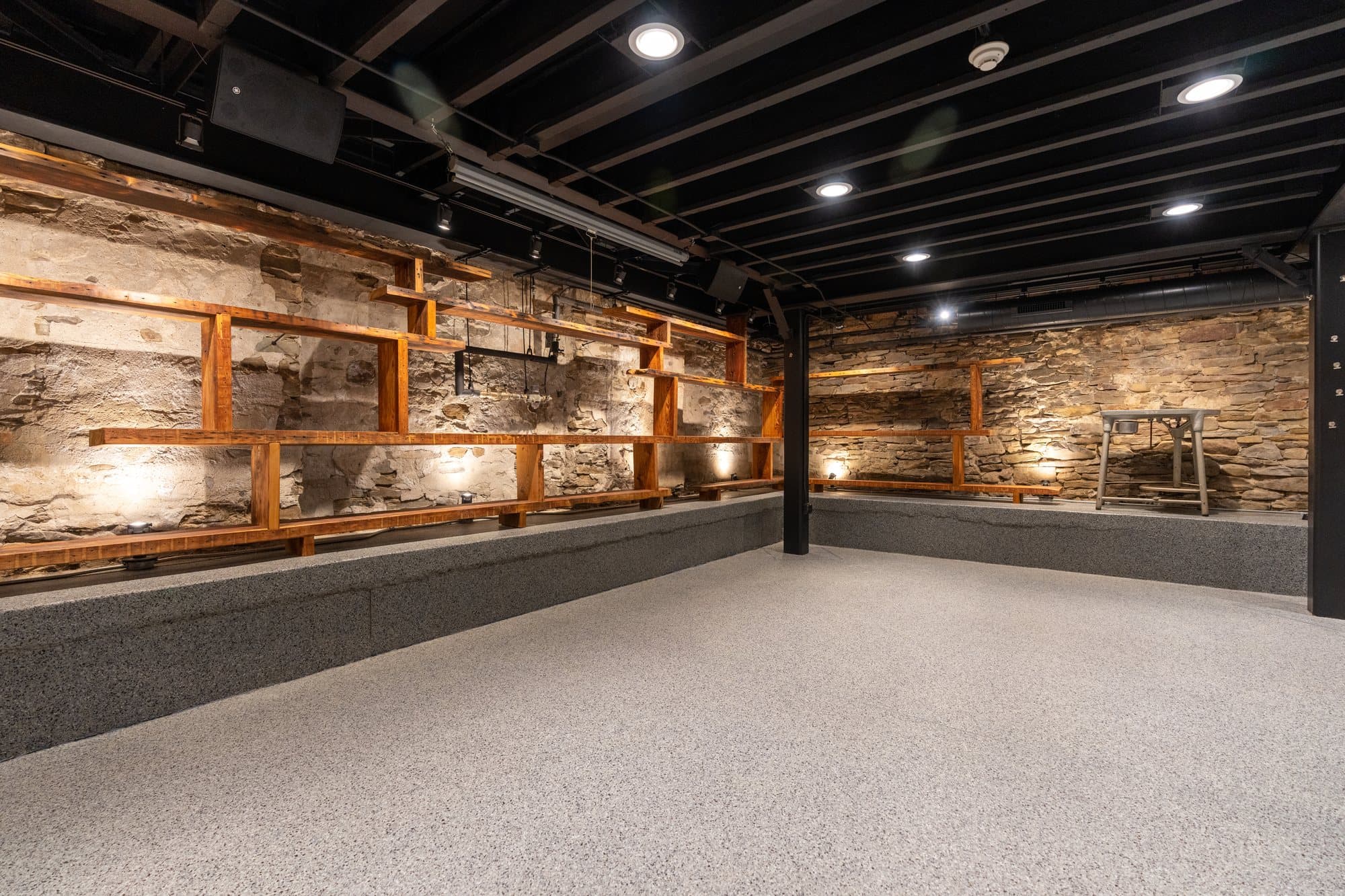 Large decorative coated concrete floor in an arts center lobby